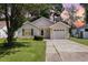Charming one-story house with a driveway and landscaped lawn at 6458 Sweet Gum Trail, Myrtle Beach, SC 29588