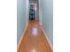 Hallway with light blue walls and wood flooring at 6458 Sweet Gum Trail, Myrtle Beach, SC 29588