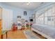 Bedroom with twin bed, wood floors, and built in shelves at 6458 Sweet Gum Trail, Myrtle Beach, SC 29588