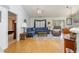 Living room with sectional sofa and wood flooring at 6458 Sweet Gum Trail, Myrtle Beach, SC 29588