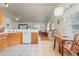 Kitchen with ample cabinetry, breakfast nook, and tile floors at 6458 Sweet Gum Trail, Myrtle Beach, SC 29588