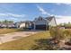 House exterior with a two-car garage and landscaping at 1109 Dalmore Ct., Conway, SC 29526