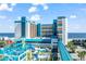 Oceanfront hotel with waterpark and walkway, offering stunning ocean views at 1501 S Ocean Blvd. # 1235, Myrtle Beach, SC 29577