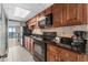 Well-equipped kitchen with modern appliances and granite countertops at 1501 S Ocean Blvd. # 1235, Myrtle Beach, SC 29577