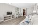 Living room with sofa, dining table, and kitchen view at 1501 S Ocean Blvd. # 1235, Myrtle Beach, SC 29577