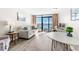 Comfortable living room with ocean view and light wood floors at 1501 S Ocean Blvd. # 1235, Myrtle Beach, SC 29577