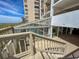 Enclosed heated pool area with stairs leading down at 6108 N Ocean Blvd. N, North Myrtle Beach, SC 29582
