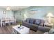 Beach-themed living room with dining area and comfortable seating at 202 75Th Ave N # 5706/5707, Myrtle Beach, SC 29572