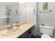 Clean bathroom with single sink vanity, toilet and shower/tub combo at 202 75Th Ave N # 5706/5707, Myrtle Beach, SC 29572