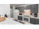 Kitchen with gray cabinets and white appliances at 202 75Th Ave N # 5706/5707, Myrtle Beach, SC 29572
