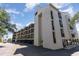 Exterior view of three-story building with parking at 202 75Th Ave N # 5706/5707, Myrtle Beach, SC 29572
