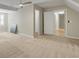 Large bedroom featuring neutral walls, carpet flooring, and a ceiling fan at 3758 Loblolly Ave., Little River, SC 29566