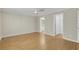Large bedroom with hardwood floors and access to bathroom at 3758 Loblolly Ave., Little River, SC 29566