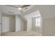 Well-lit bedroom with neutral walls, carpet flooring, and a ceiling fan at 3758 Loblolly Ave., Little River, SC 29566