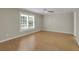 Spacious bedroom with ceiling fan and hardwood floors at 3758 Loblolly Ave., Little River, SC 29566