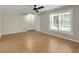 Spacious living room with hardwood floors and a view of the stairs at 3758 Loblolly Ave., Little River, SC 29566