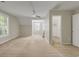 Bright bedroom with vaulted ceiling, neutral walls, carpet, and window with shutters at 3758 Loblolly Ave., Little River, SC 29566