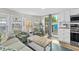 Sunlit living room with sofa, chairs and coffee table at 6001 - 1864A S Kings Hwy., Myrtle Beach, SC 29575