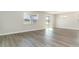Bright dining room with hardwood floors and sliding glass doors at 357 Glacier Way, Conway, SC 29526