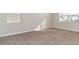 Bright bedroom with neutral carpeting and window coverings at 357 Glacier Way, Conway, SC 29526