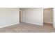 Spacious bedroom with neutral walls, carpet flooring, and a large closet at 357 Glacier Way, Conway, SC 29526
