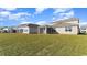 Two-story house with beige siding and screened porch at 357 Glacier Way, Conway, SC 29526