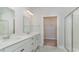 Double vanity bathroom with a shower and linen closet at 357 Glacier Way, Conway, SC 29526