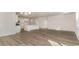 Open concept kitchen and dining area with island and light wood flooring at 357 Glacier Way, Conway, SC 29526