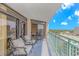 Ocean view from a condo balcony with seating area, overlooking cityscape at 201 74Th Ave. N # 1002, Myrtle Beach, SC 29572