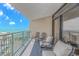 Ocean view from a condo balcony with seating, ideal for enjoying the breeze at 201 74Th Ave. N # 1002, Myrtle Beach, SC 29572