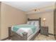 Cozy bedroom with a double bed, nightstand, and tiled floor at 201 74Th Ave. N # 1002, Myrtle Beach, SC 29572