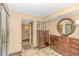 Elegant bathroom with double vanity and large mirror at 201 74Th Ave. N # 1002, Myrtle Beach, SC 29572