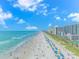 Aerial view of beach with oceanfront high rise hotels at 201 74Th Ave. N # 1002, Myrtle Beach, SC 29572