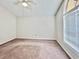 Spacious bedroom with vaulted ceiling and window at 829 9Th Ave. S, North Myrtle Beach, SC 29582