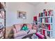 Cozy sitting area with a sofa and shelves filled with dolls at 3412 Westminster Dr., Myrtle Beach, SC 29588