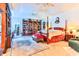 Spacious main bedroom with king bed, built-in shelving, and access to additional rooms at 3412 Westminster Dr., Myrtle Beach, SC 29588