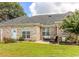 Brick house with a patio and seating area at 3412 Westminster Dr., Myrtle Beach, SC 29588
