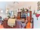 Bright living room with hardwood floors, fireplace and entertainment center at 3412 Westminster Dr., Myrtle Beach, SC 29588