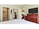 Main bedroom with a king-size bed, large TV, and plenty of storage at 3412 Westminster Dr., Myrtle Beach, SC 29588