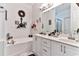 Bathroom with double vanity, soaking tub, and a separate shower at 3412 Westminster Dr., Myrtle Beach, SC 29588