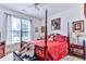 Main bedroom with a post bed, and plenty of natural light at 3412 Westminster Dr., Myrtle Beach, SC 29588