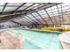 Indoor pool area with water slide and hot tub at 2401 Ocean Blvd. S # 1062, Myrtle Beach, SC 29577