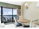 Small dining area with table and chairs near ocean view at 2401 Ocean Blvd. S # 1062, Myrtle Beach, SC 29577