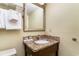 Bathroom with granite vanity and mirror at 2401 Ocean Blvd. S # 1062, Myrtle Beach, SC 29577