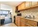 View of the kitchen and living room with ocean view at 2401 Ocean Blvd. S # 1062, Myrtle Beach, SC 29577