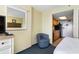 Small kitchen with wood cabinets and black appliances at 2401 Ocean Blvd. S # 1062, Myrtle Beach, SC 29577
