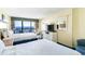 Bedroom with two double beds and ocean view at 2401 Ocean Blvd. S # 1062, Myrtle Beach, SC 29577