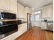 Modern kitchen with stainless steel appliances and light-colored cabinets at 758 Parker Dr., Pawleys Island, SC 29585