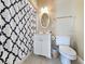 Clean bathroom with shower/tub combo, toilet and white vanity at 758 Parker Dr., Pawleys Island, SC 29585