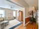 Sitting room with hardwood floors, access to hallway, and built-in shelving at 758 Parker Dr., Pawleys Island, SC 29585